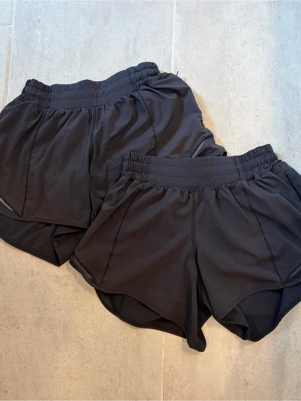 Lululemon Black Hotty Hot 4” low rise shorts — 2 PAIRS